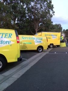 Three Servicemaster vans